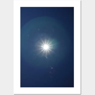 Lumina Solar Eclipse II - white star like sun glare on clear navy blue sky and chromatic aberrations (lens flares) photograph Posters and Art